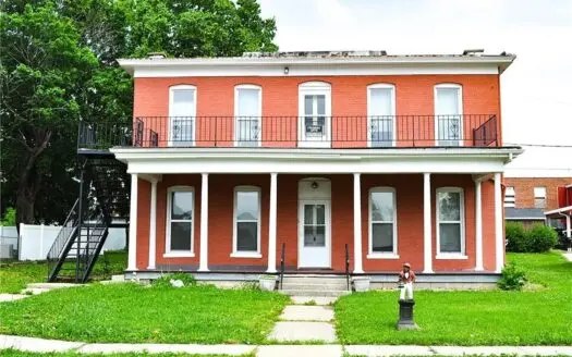 Historic 1880s Duplex with Strong Income Potential in King City