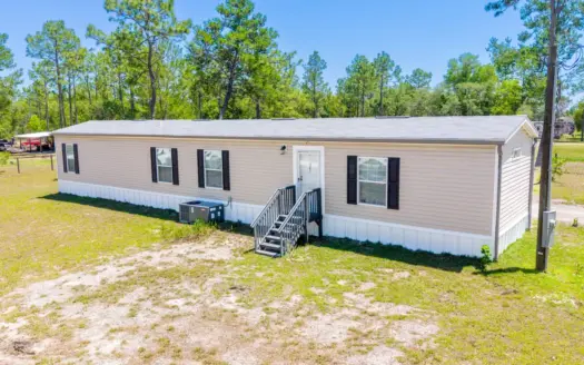 1 Acre, Fully Fenced & Move-In Ready in Williston!
