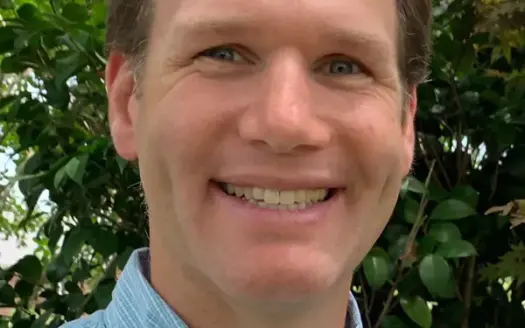 agent profile picture for Justin Giles on investment properties website