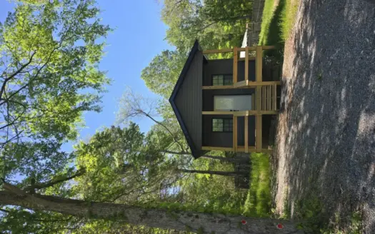 Affordable lake-area retreat with income potential