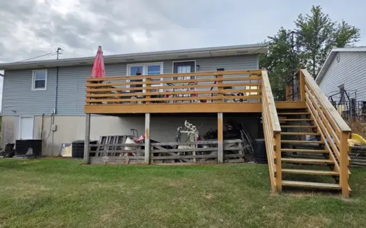 Charming 3-Bedroom Home with Rec Room, Garage & Spacious Lot