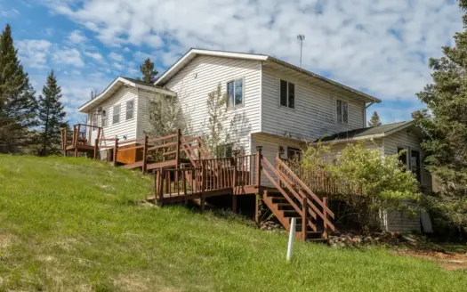 Home or Cabin on 8 Acres with Birch Creek Frontage