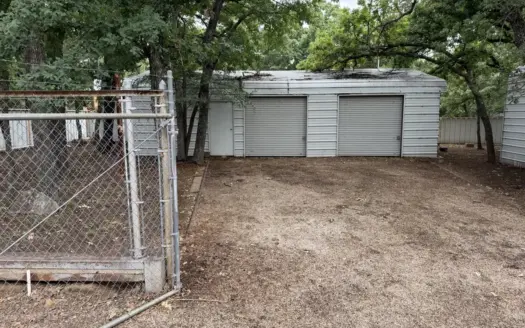 LAKE BROWNWOOD propertyy with carport two garages and plenty of s