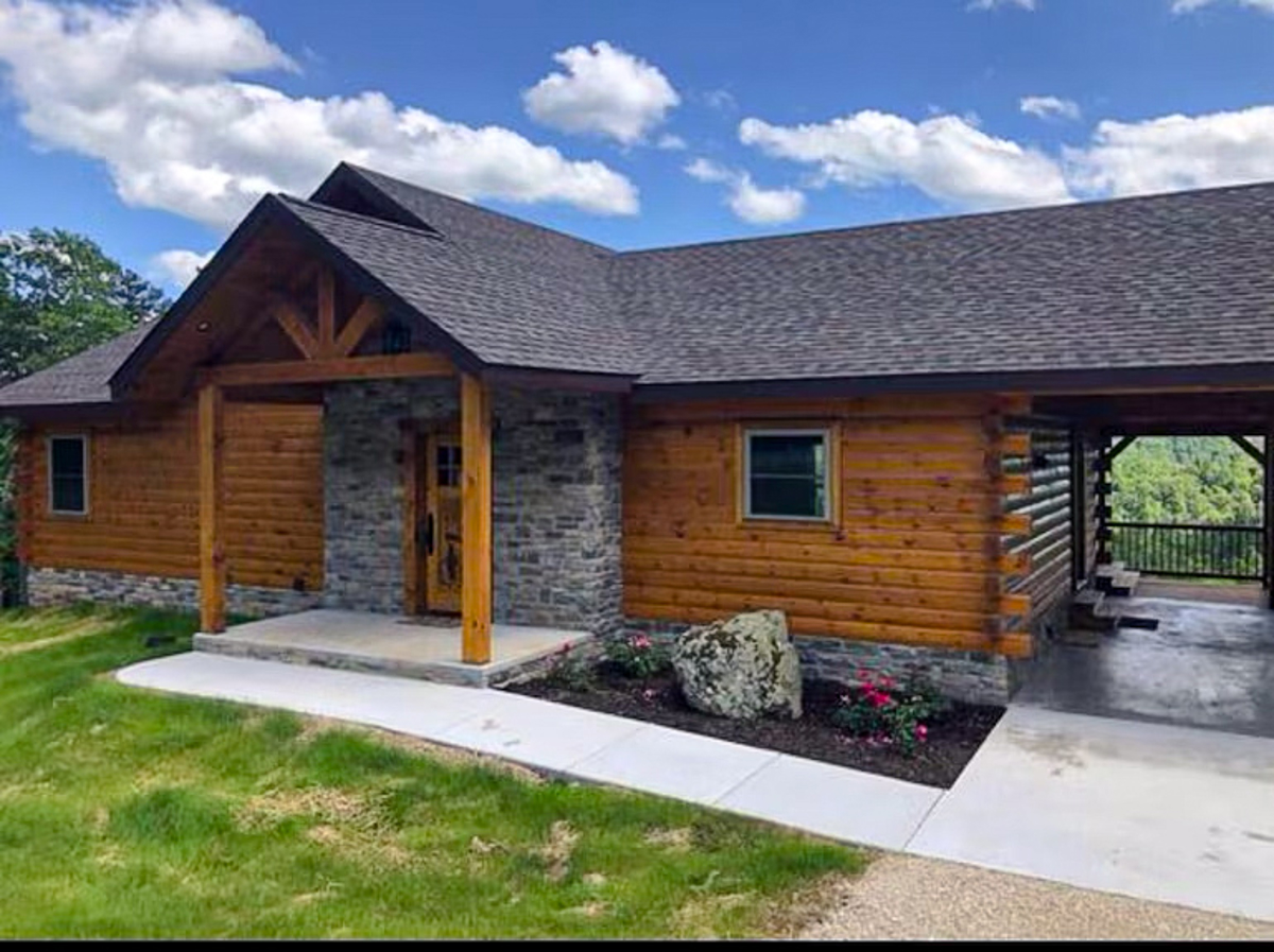 Large Custom Log Home Overlooking The Ozarks For Sale