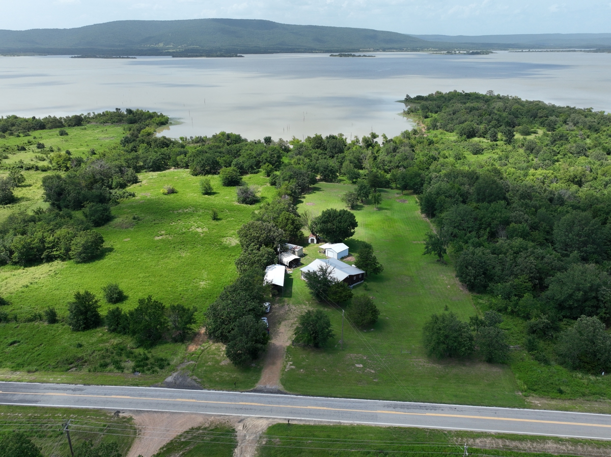 Sardis Lake property: Lake House with outbuildings