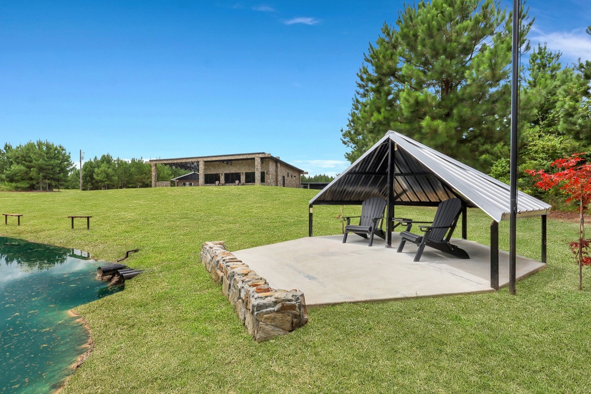 Stone Crest: 207+ Acres with Custom Home in Midville, GA