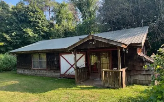Cottage on Wooded Acreage For Sale in Upstate New York
