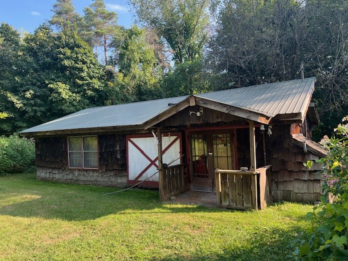 Cottage on Wooded Acreage For Sale in Upstate New York