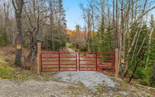 279 Acres of Land with 2 Cabins and a Large Barn with New Floor