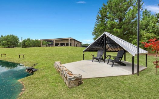 Stone Crest: 207+ Acres with Custom Home in Midville, GA