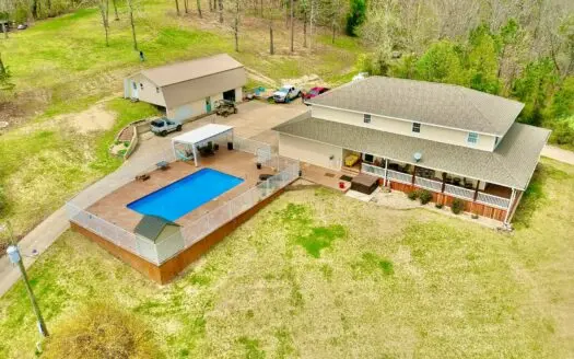 Five Bedroom, Pool Home on the Edge Of Town with 9+ Acres.