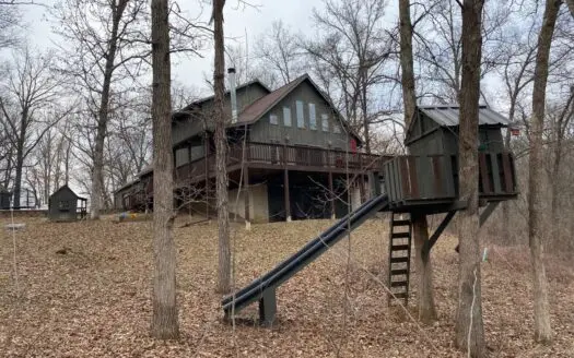 Country Home on Wooded Acreage for Sale in Ia