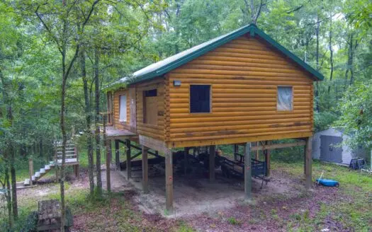 Riverfront Log Cabin on Acreage for Sale in Live Oak, Fl