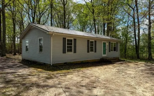 Country Living with Investment Potential: 7.45 Acres in Keeling