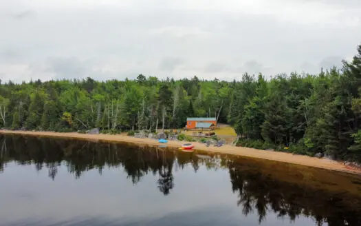 Camp with 584 Feet of Beachfront on Madagascal Pond