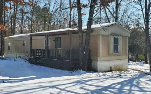 Investment Property or Starter Home in Wooded Setting!!!
