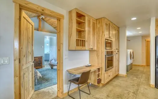 Custom Home on Acreage in Chama West with Attached Garage