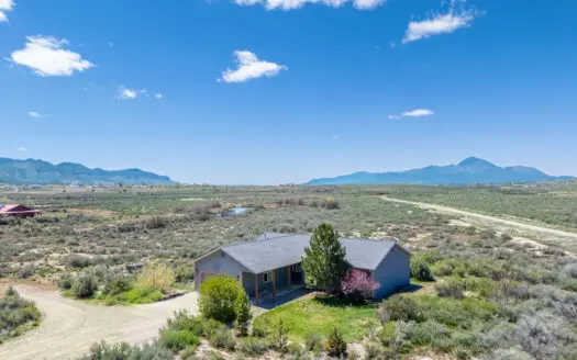 On grid solar home on acreage with privacy yet close to town