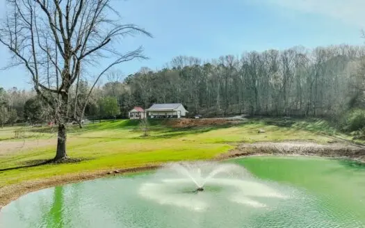 Creekfront Land for Sale in Tennessee with Pond, Shop, and Cabins