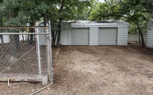 LAKE BROWNWOOD propertyy with carport two garages and plenty of s