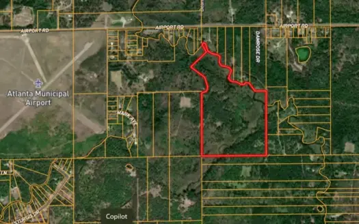 7.59 Acres Riverfront Wooded Acreage Atlanta MI