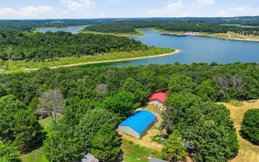 Home Bordering Corps on Bull Shoals Lake with Large Shop Building