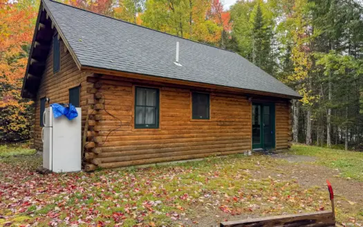 Mattanawcook Lake Log Home with 440 Feet of Waterfront