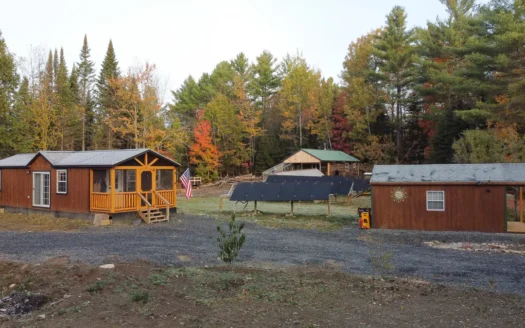 Off-Grid Maine Homestead w/ Dual Cabins, Solar Power & 49± Acres