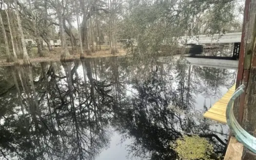 Beautiful Tiny Home on Pickett Lake Canal for Only $85,000!!