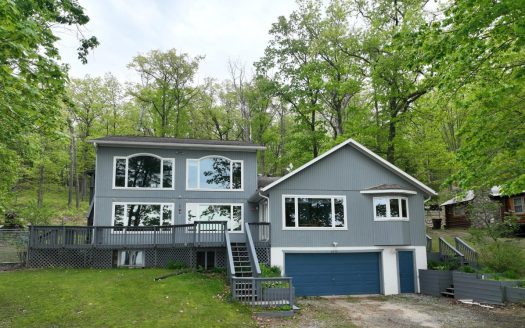 Atlanta Michigan waterfront real estate listing photo 1