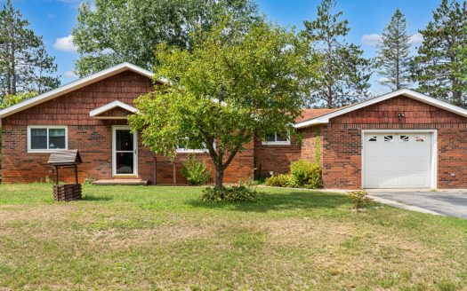 Atlanta Michigan riverfront real estate listing photo 1