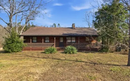 Riverfront Log Home on 5 Acres with Income Potential