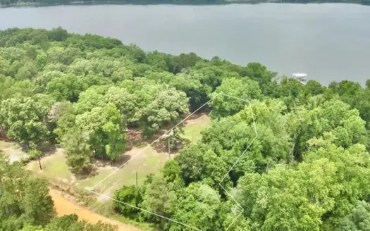 This waterfront property offers a rare combination of privacy!