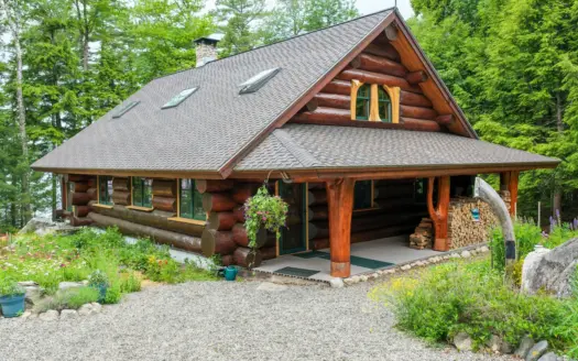 A Log Home Masterpiece in the Maine Woods on West Lake