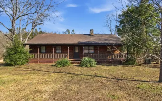 Riverfront Log Home on 5 Acres with Income Potential