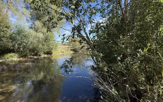 Riverfront property in Chama with Well, Power, and Septic