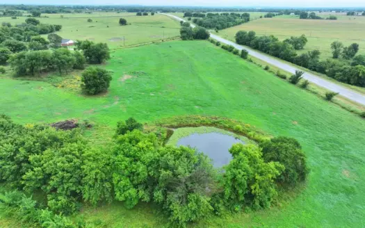 Excellent Investment 11.56+/- Acres w/ Highway Frontage & Pond